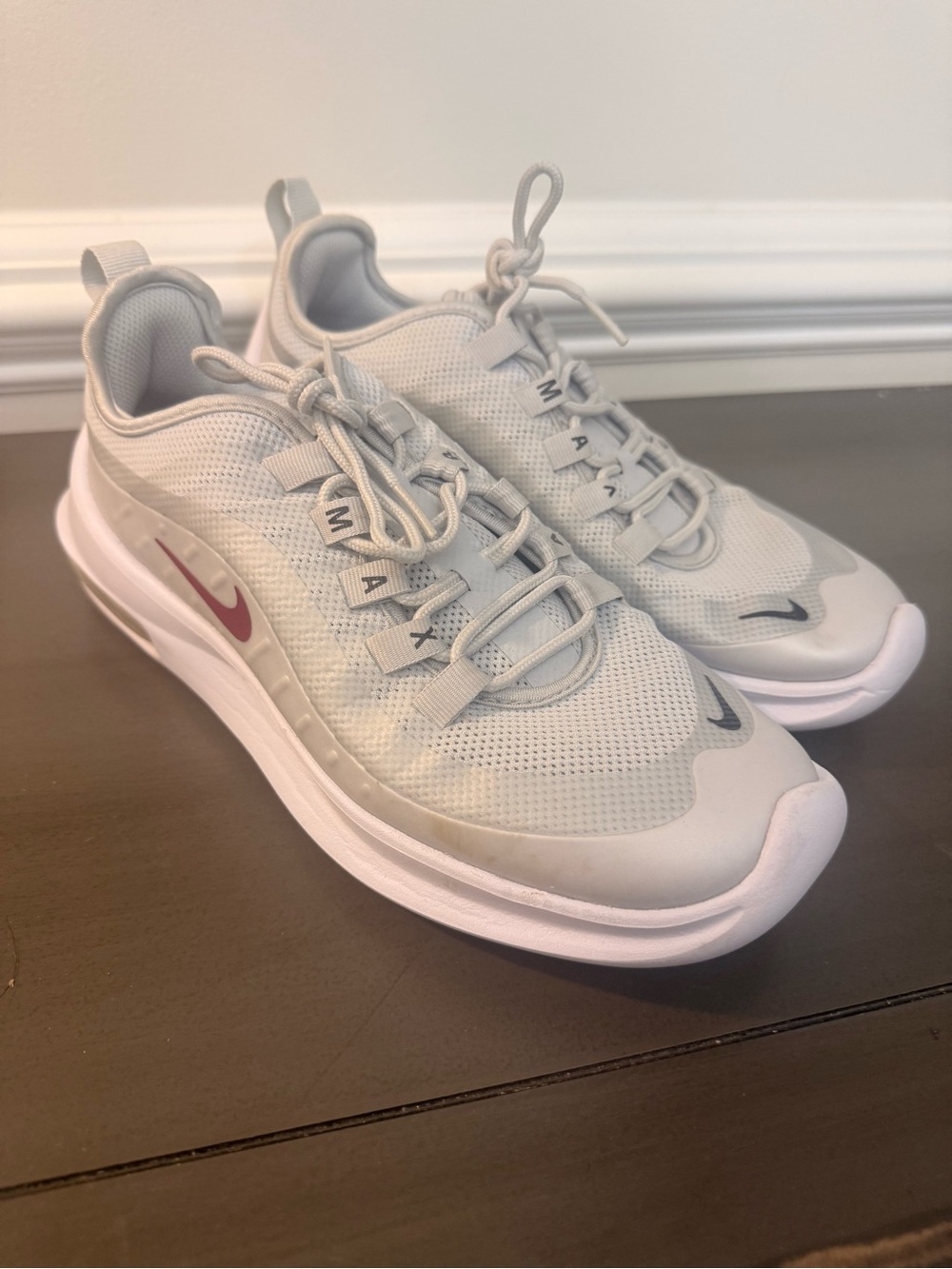 Nike Light Gray Athletic Sneakers with Pink Swoosh